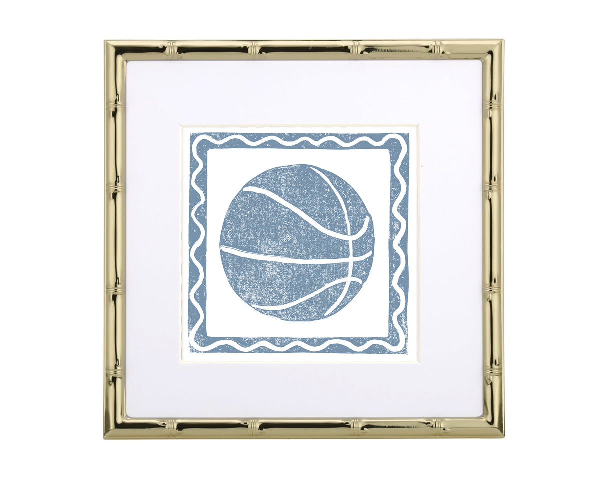 Framed artwork with a blue and white basketball on a white background
