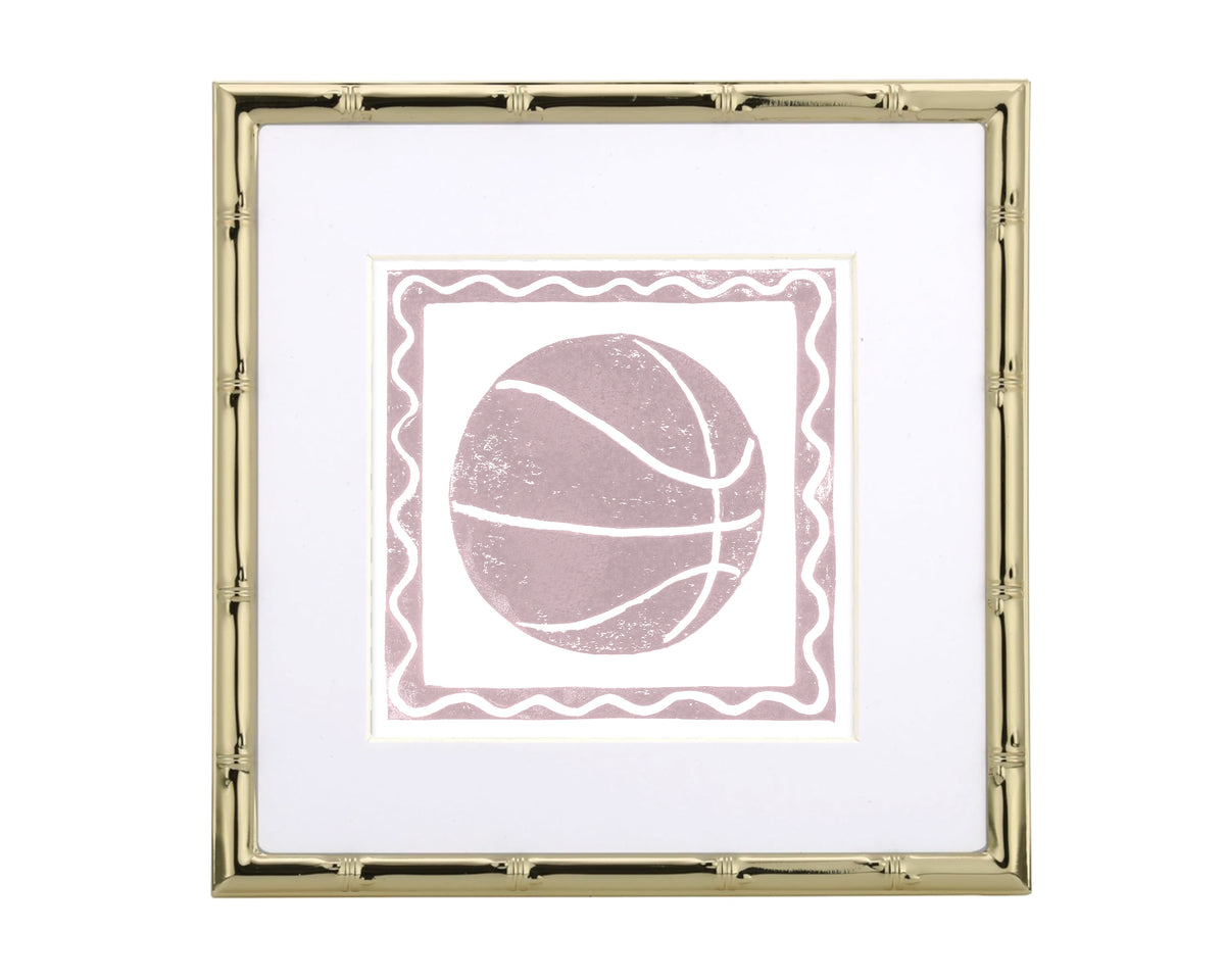 Framed artwork with a pink basketball design on a white background
