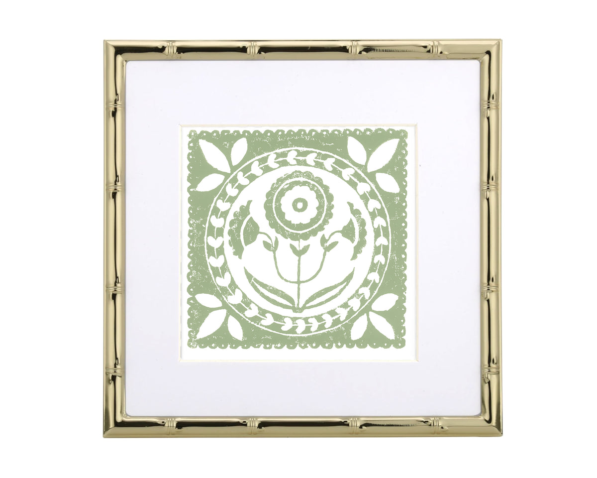 Framed artwork with a green and white design on a white background