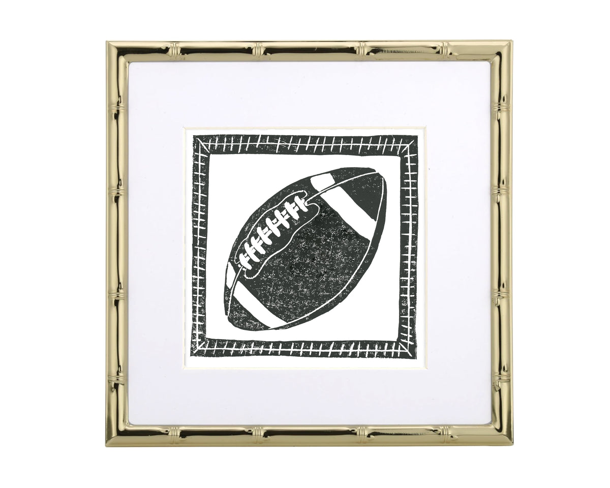 Framed artwork of a football with a gold frame on a white background