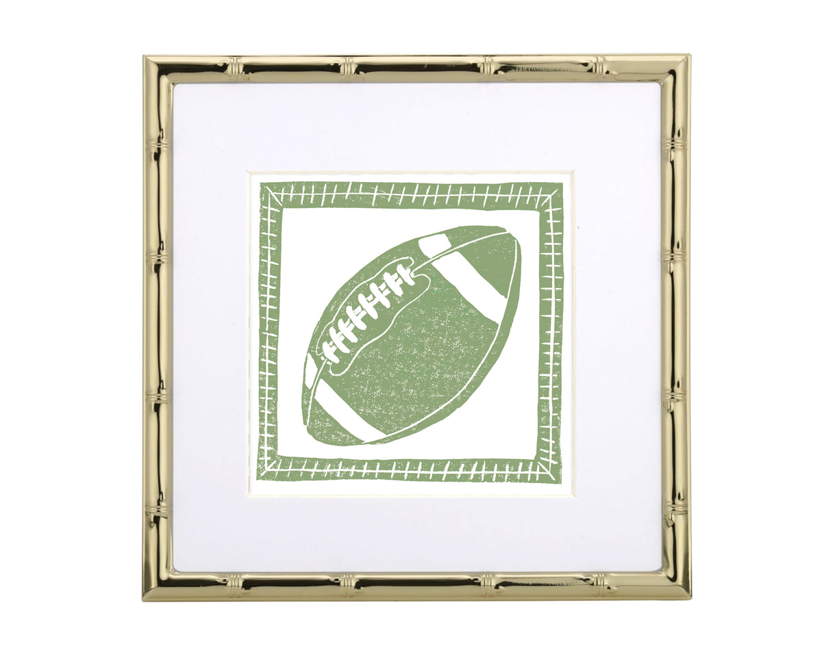 Framed artwork of a green football on a white background