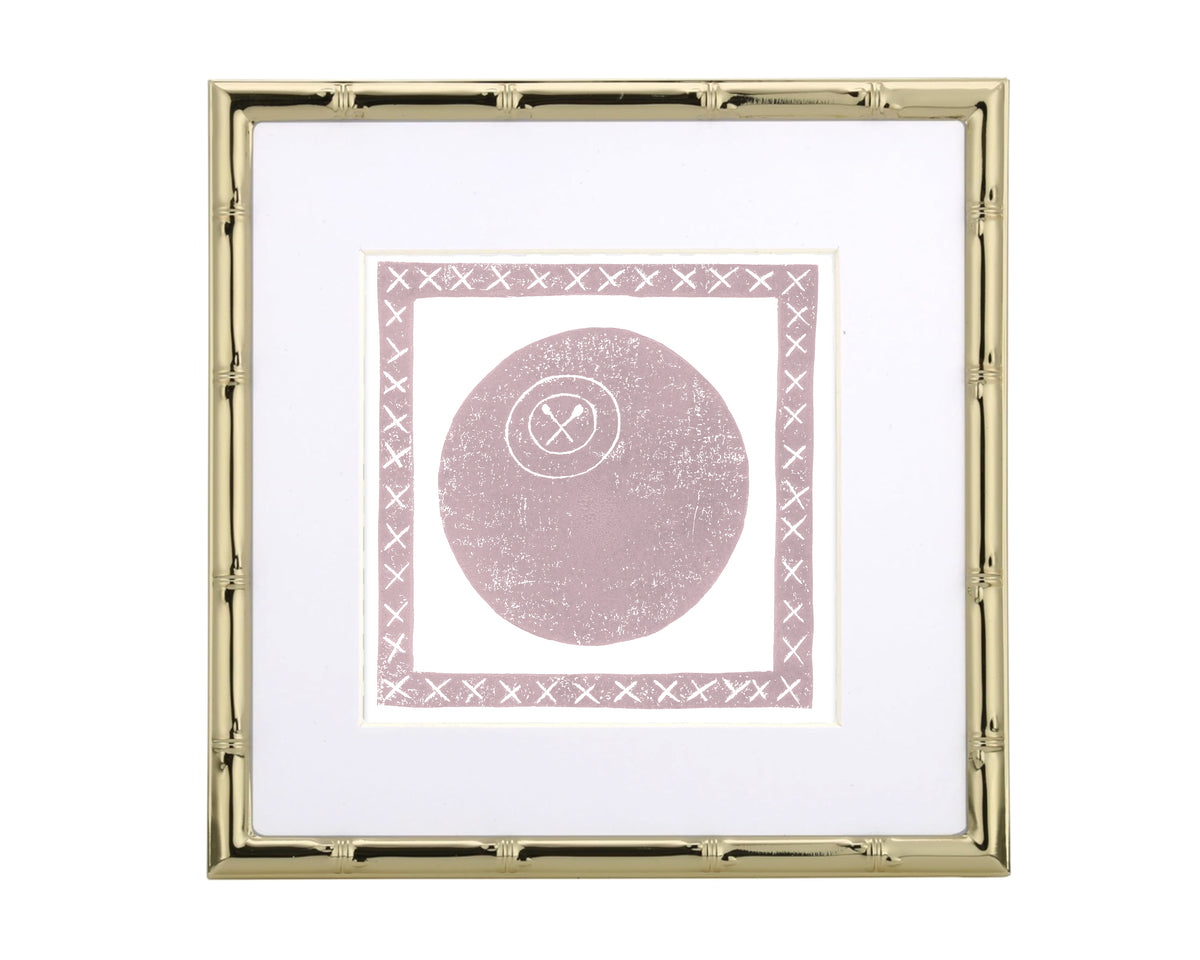 Framed artwork with a pink lacrosse ball design and gold frame on a white background