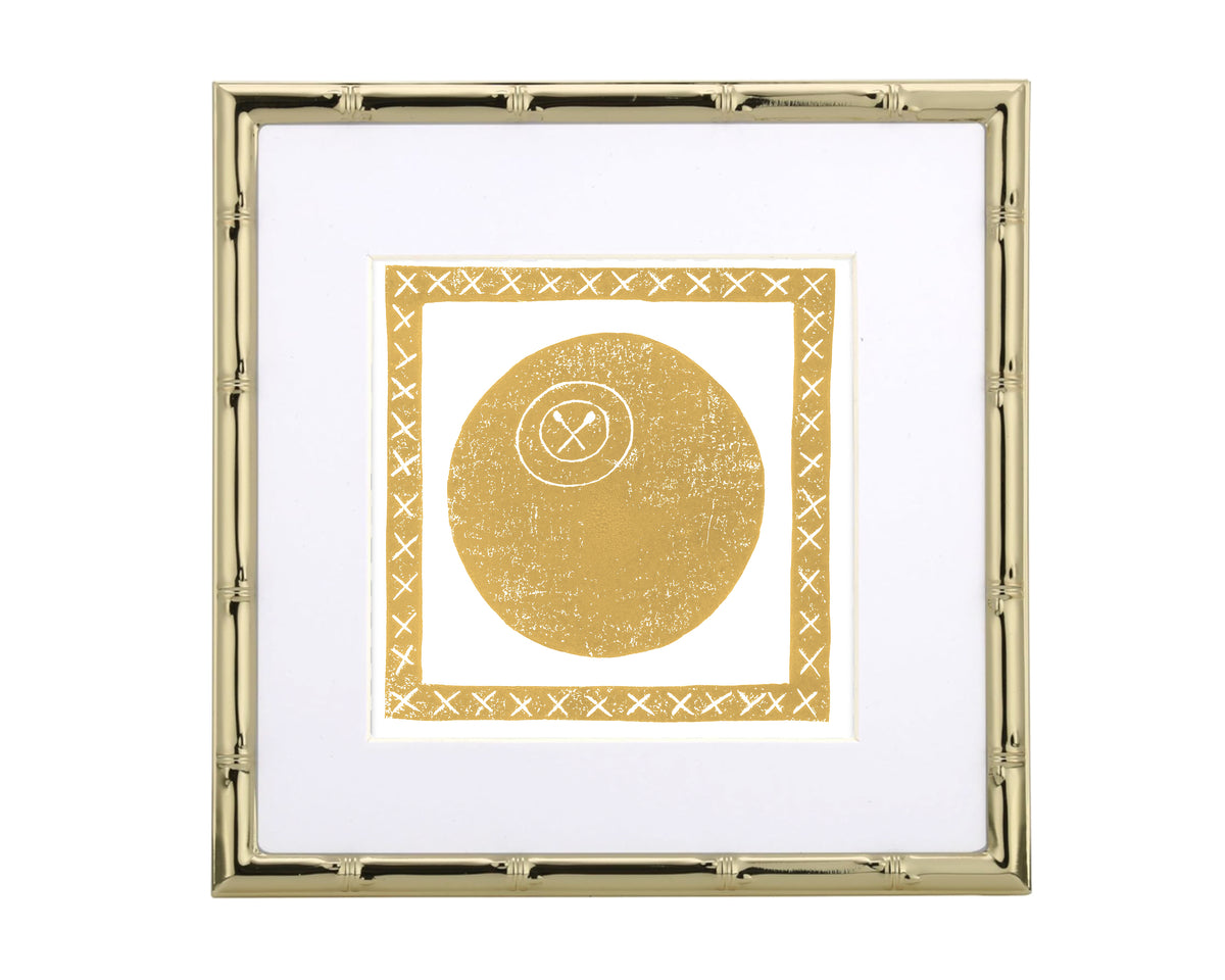 Framed artwork with a gold lacrosse ball design on a white background