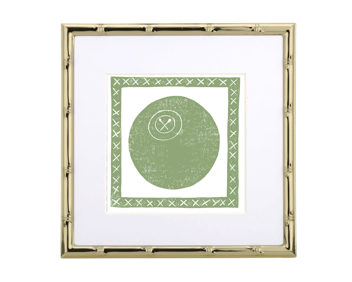 Gold-framed picture with a green circle and white border on a white background