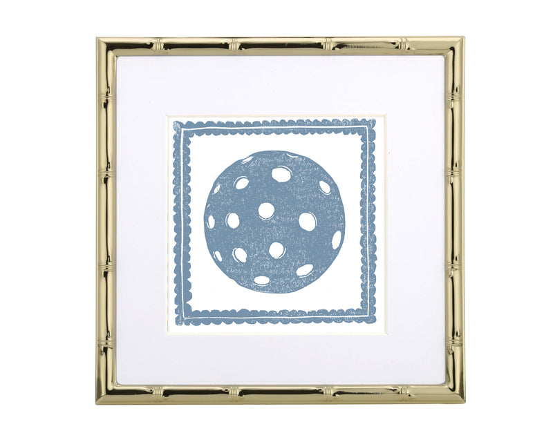 Framed artwork with a blue polka dot pickleball design on a white background