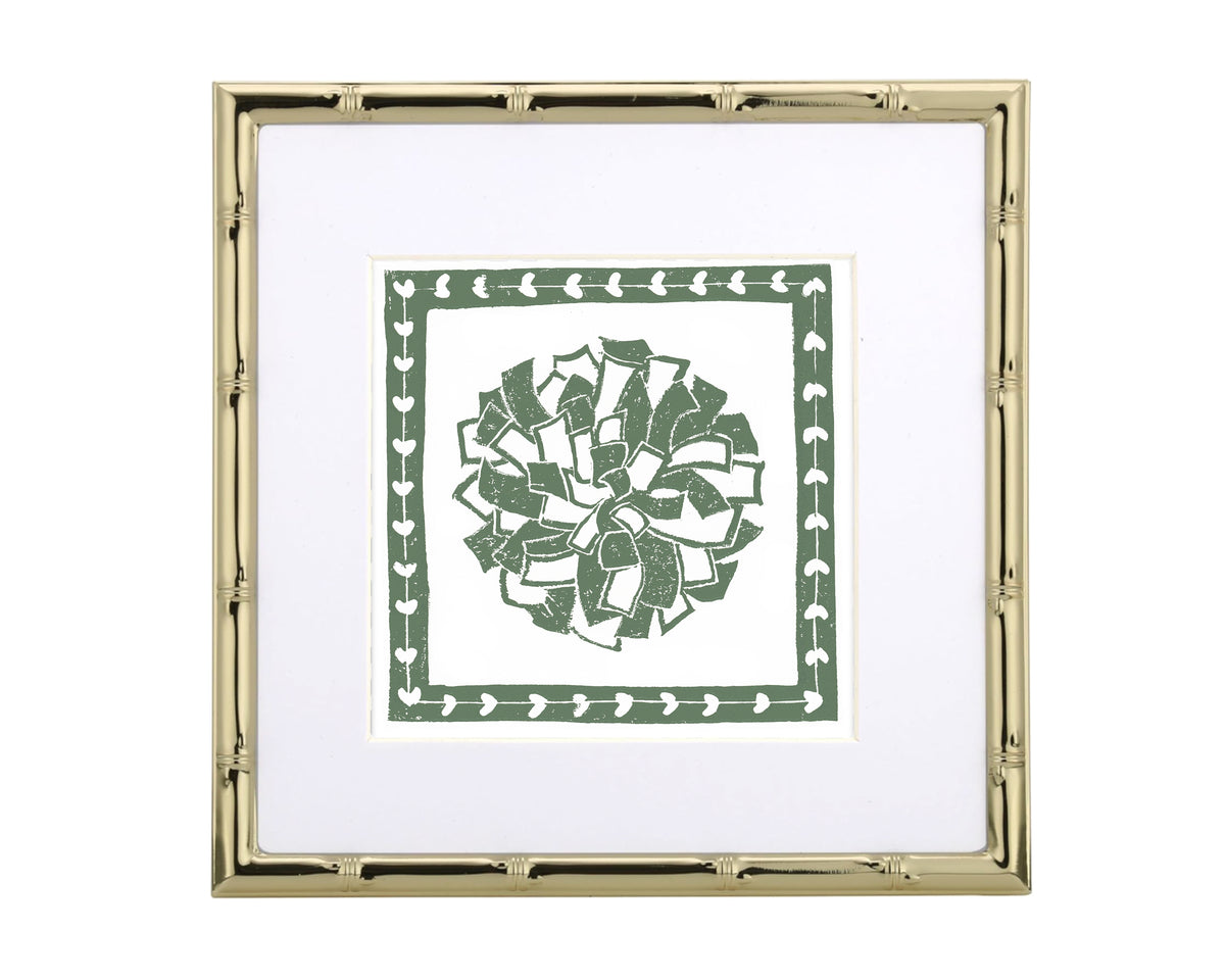 Framed artwork with a green and white design on a white background