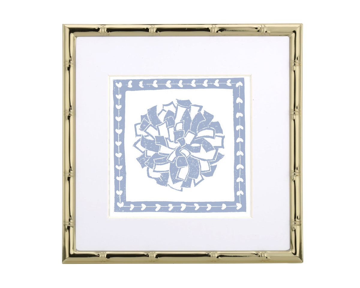 Framed artwork with a blue and white design on a white background