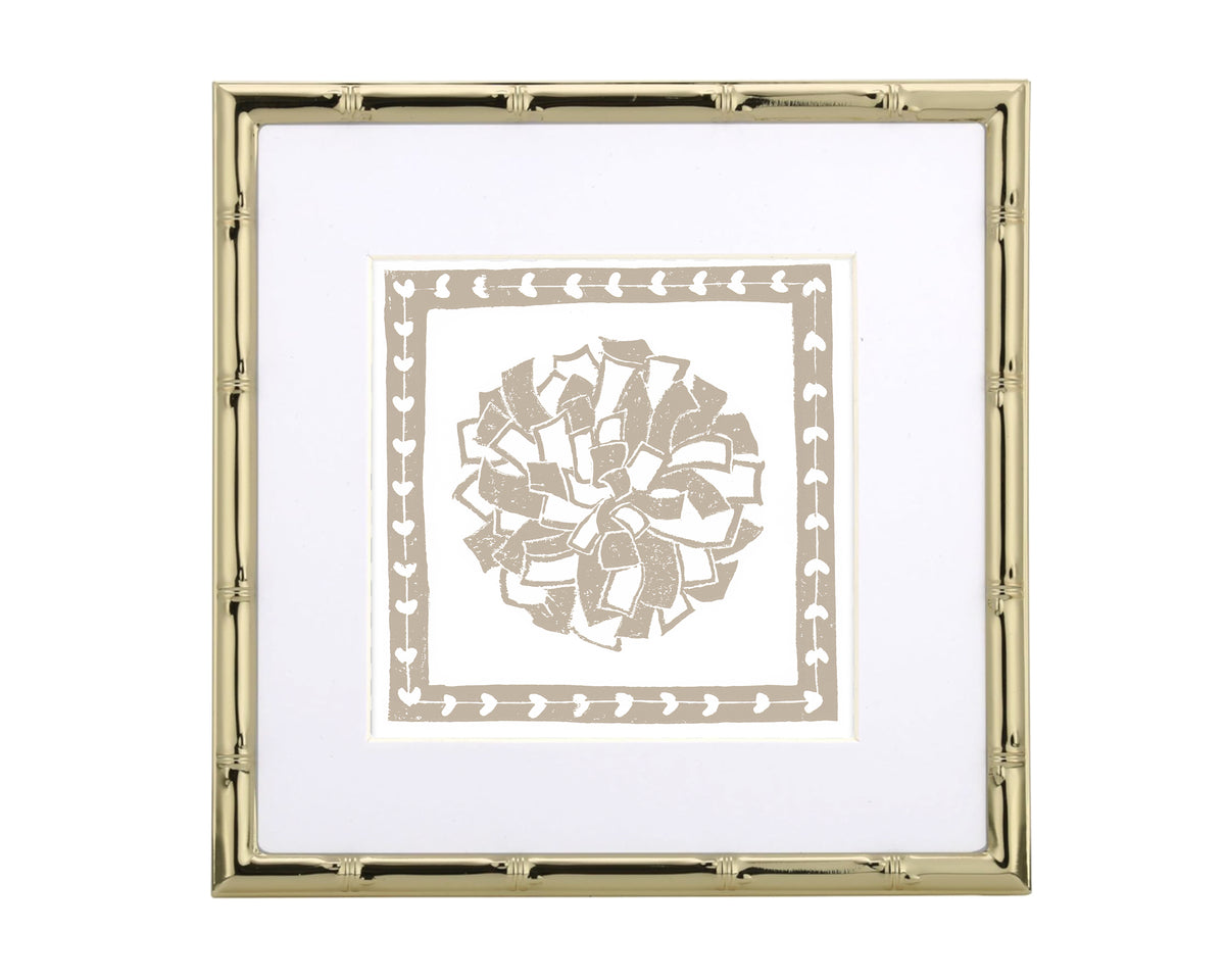 Decorative gold frame with a white center featuring a pompon design on a white background