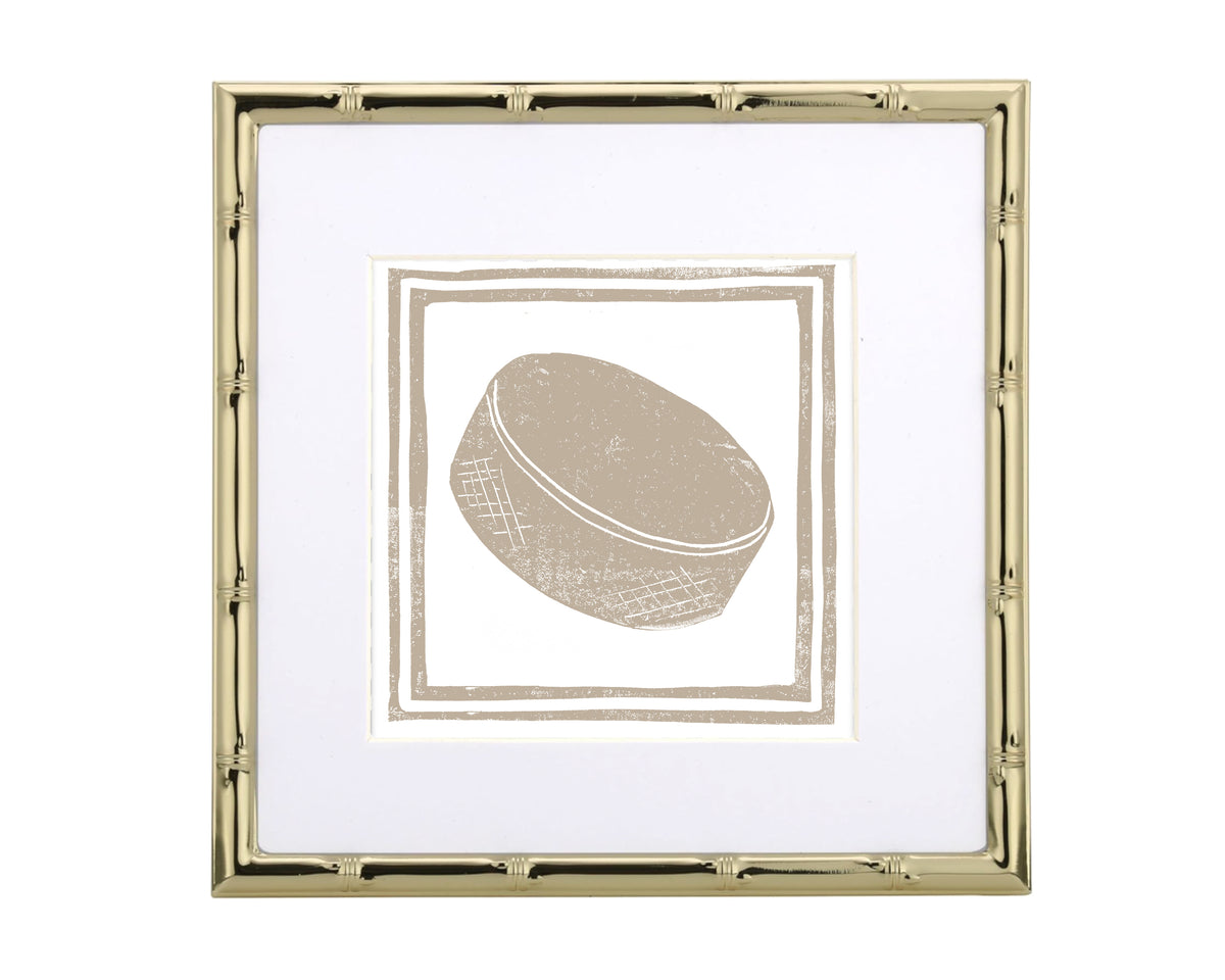 Decorative frame with a white background and a central hockey puck design.