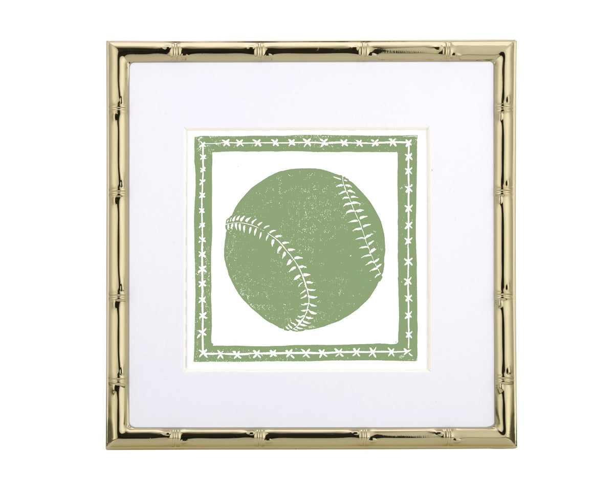 Framed artwork of a green baseball with white stitches on a white background