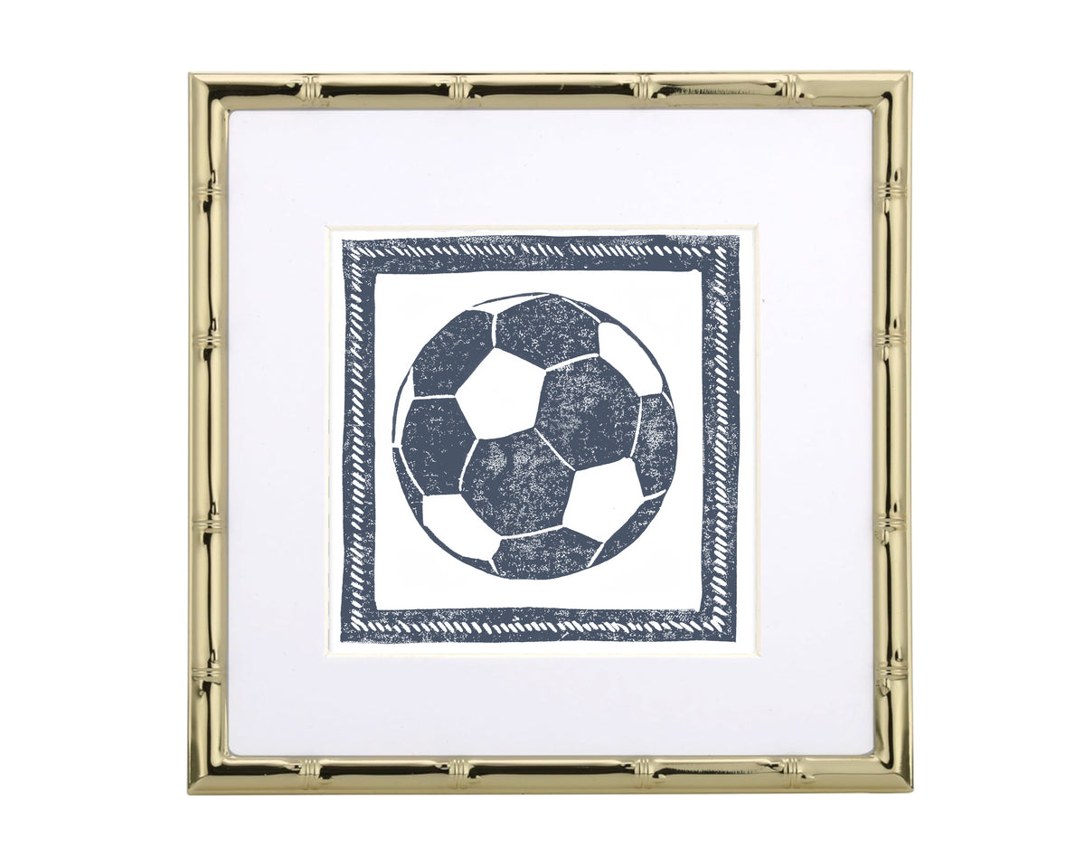 Framed artwork with a soccer ball design on a white background