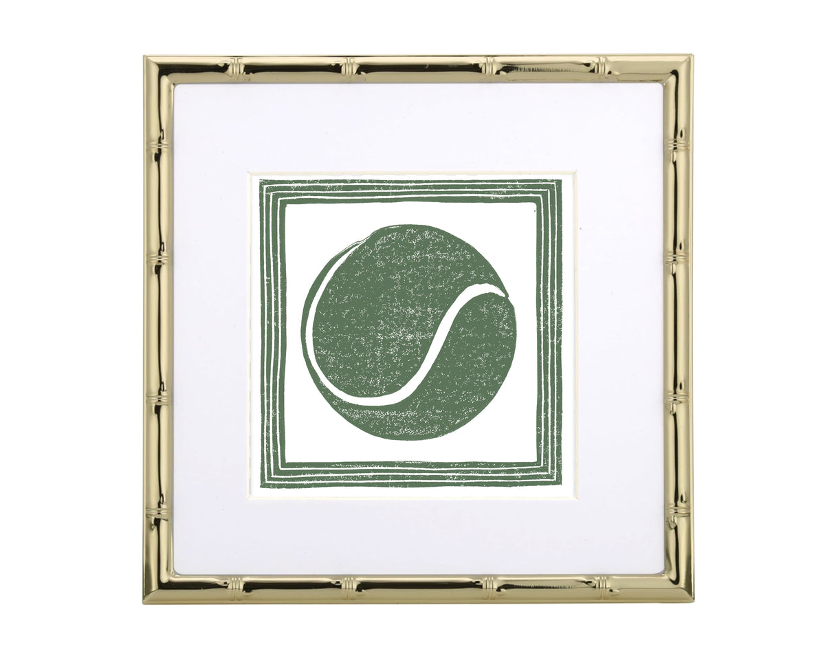 Framed artwork with a green tennis ball design on a white background