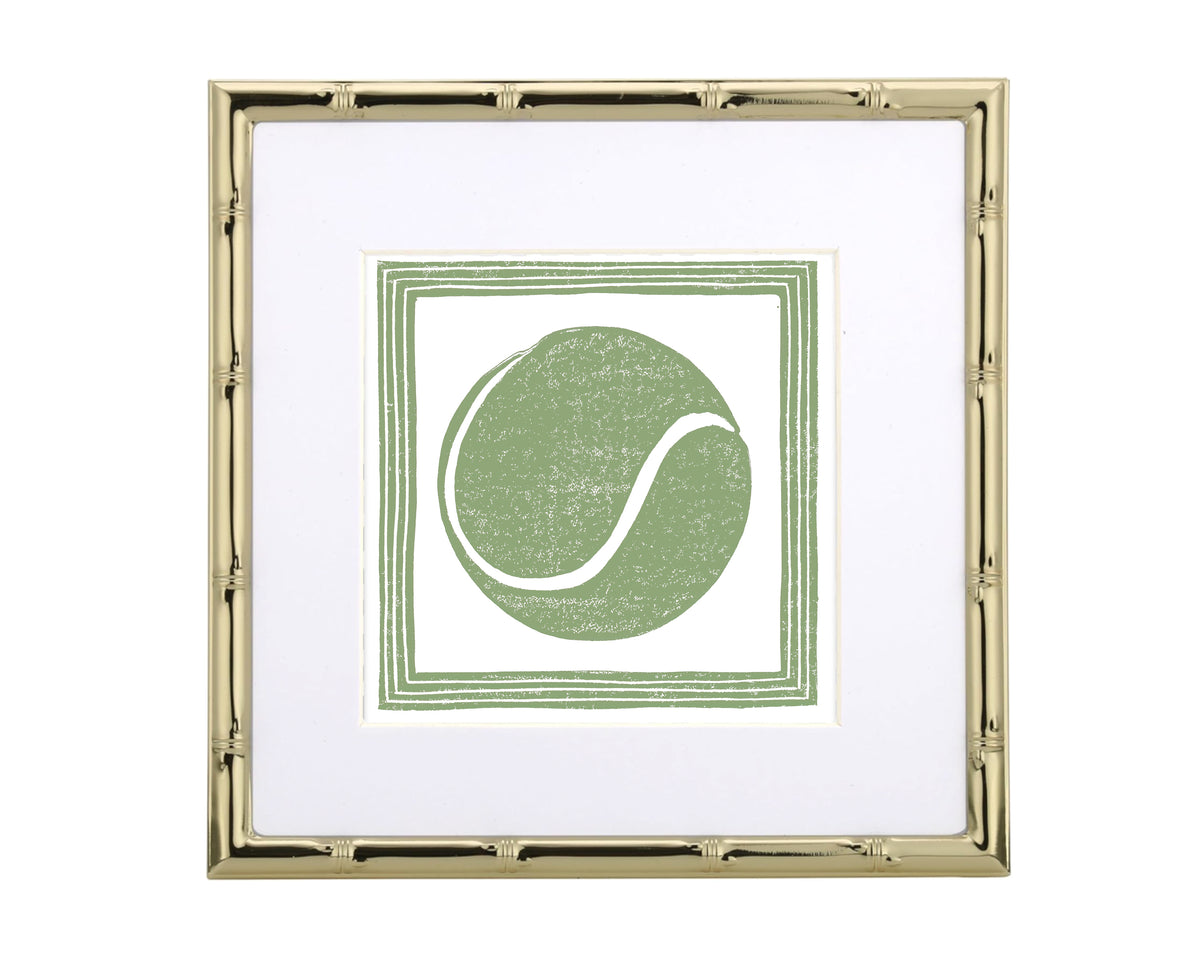 Framed artwork with a green tennis ball design on a white background