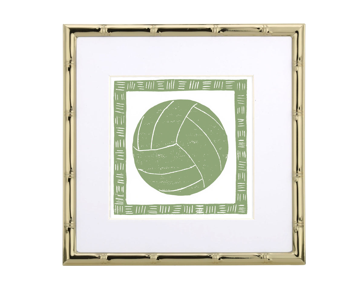 Framed artwork of a green volleyball with a gold frame on a white background