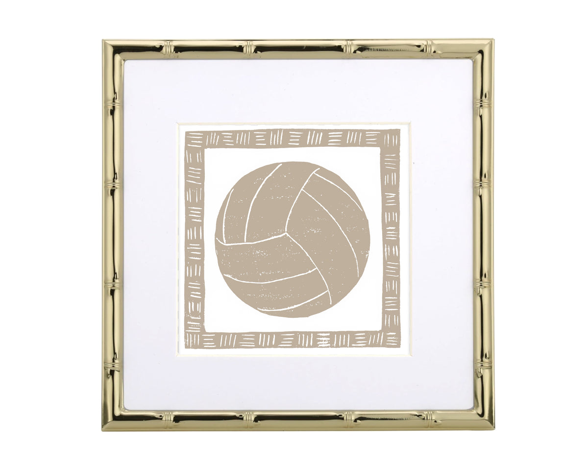 Framed artwork of a beige volleyball with a gold border on a white background