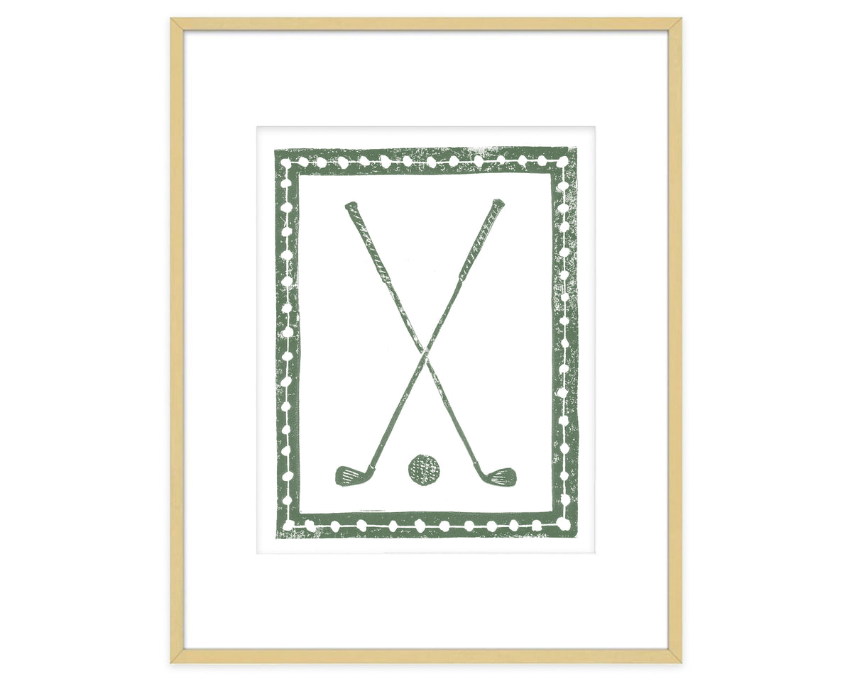 Framed artwork of two crossed golf clubs with a decorative border on a white background