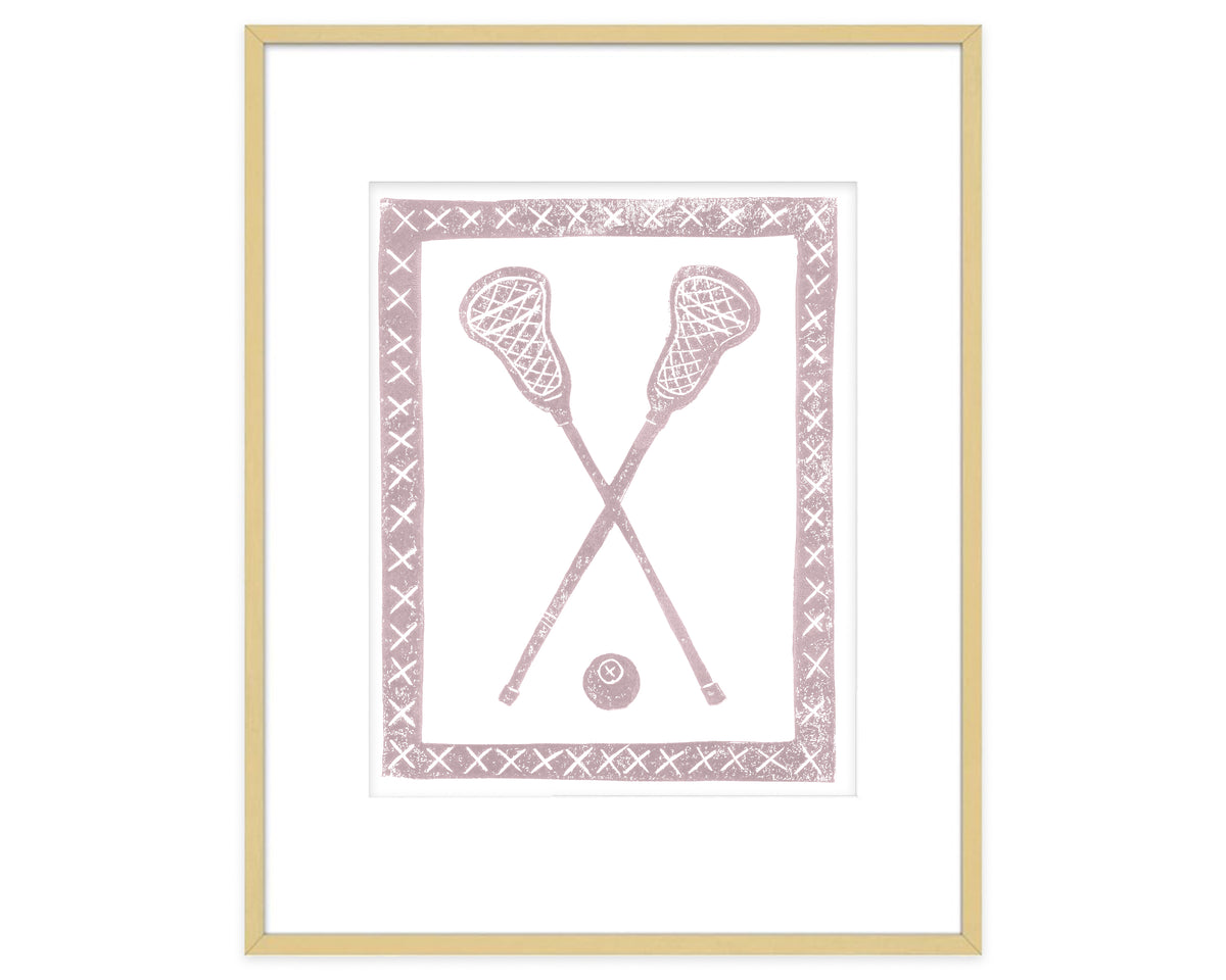 Framed artwork of crossed lacrosse sticks and a ball on a white background