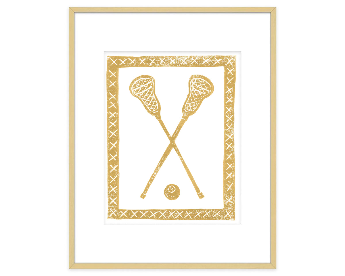 Framed artwork of crossed lacrosse sticks and a ball on a white background