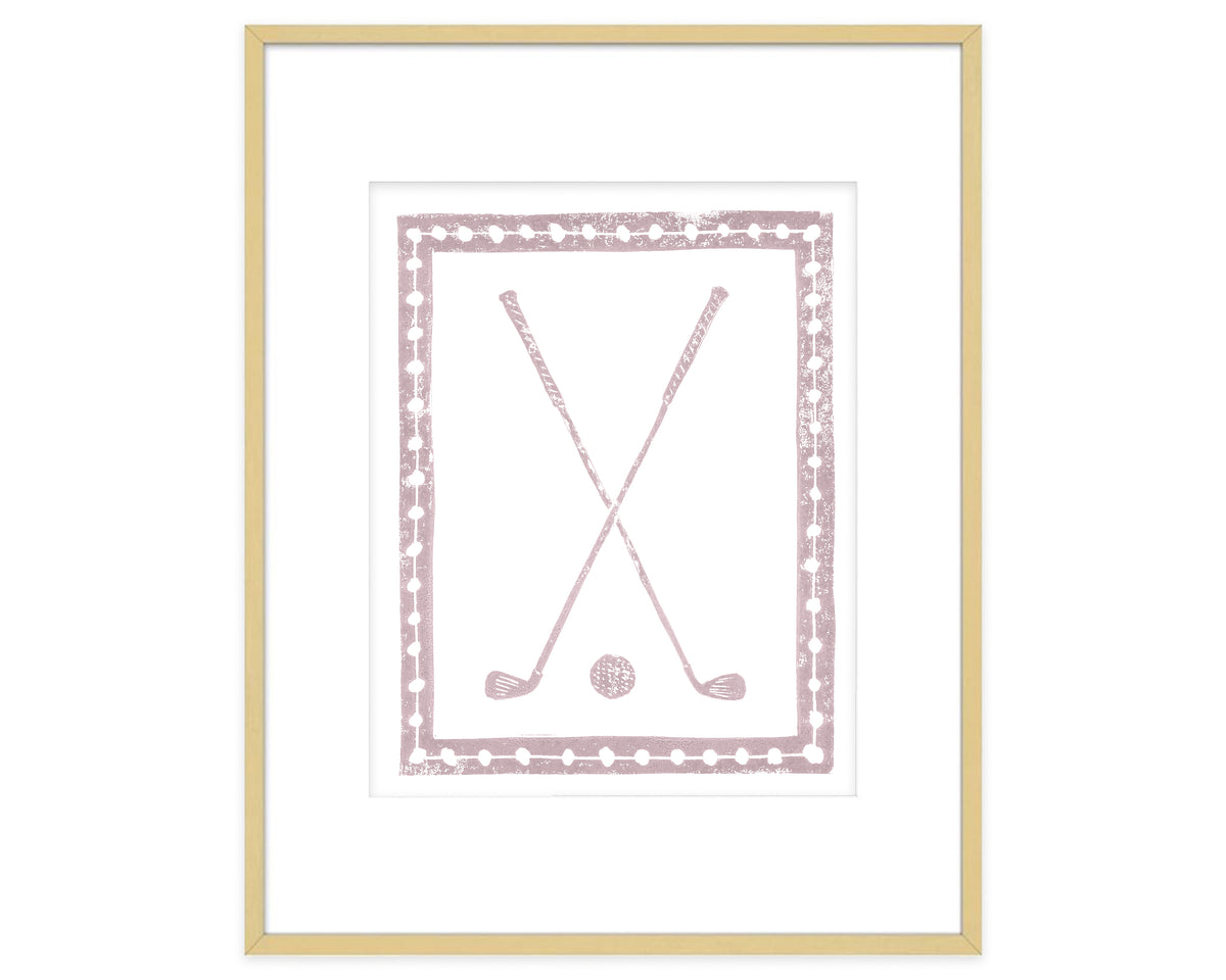 Framed artwork with pink golf clubs and ball on a white background