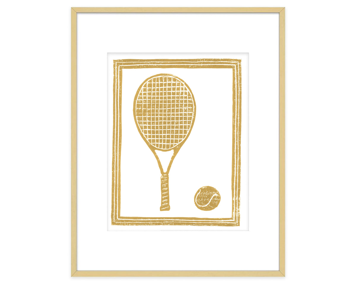 Framed artwork of a gold tennis racket and ball on a white background