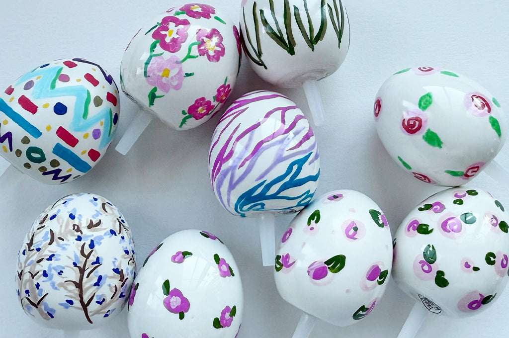 Decorative easter eggs with colorful designs on a white background