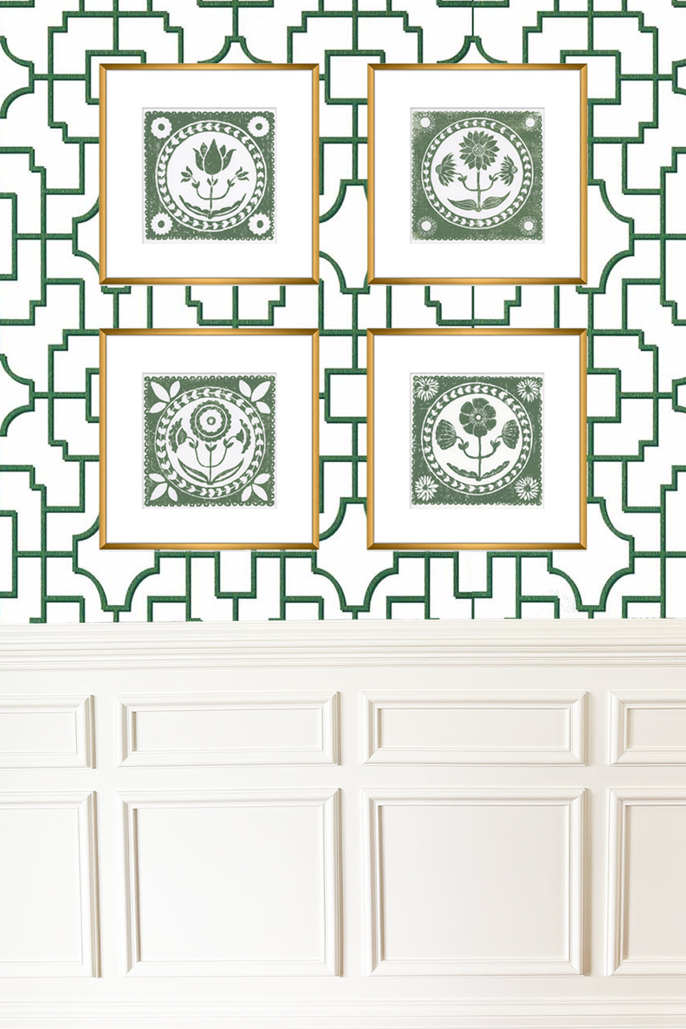 Four framed decorative prints with a green and white geometric pattern on a wall.