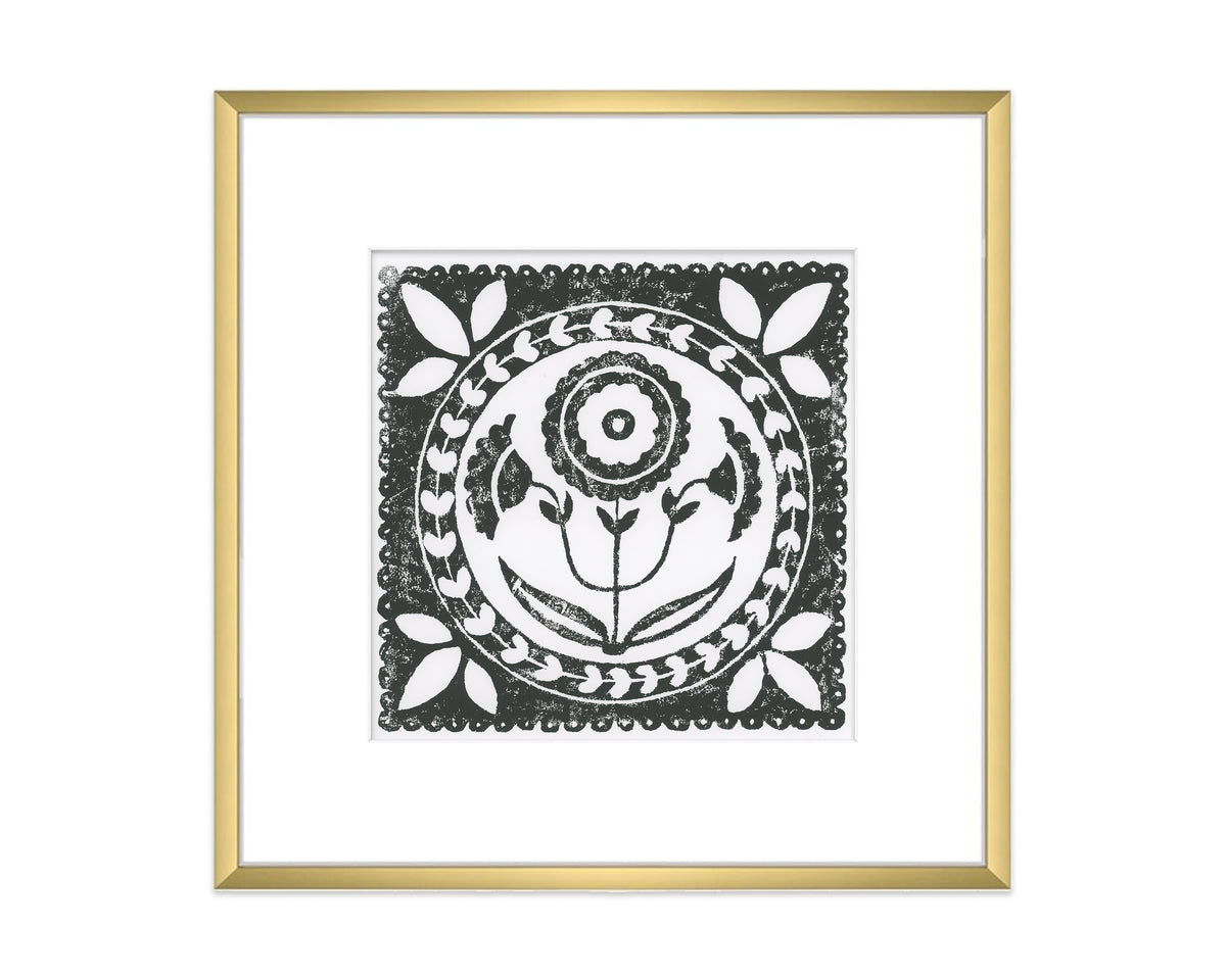 black and white daffodil flower block print in a gold matted frame on white background - botanical wall art decor