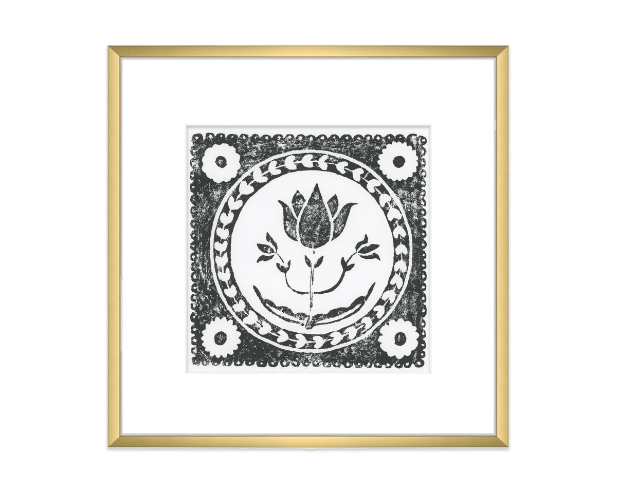 black and white tulip flower block print in a gold matted frame on white background - botanical wall art decor