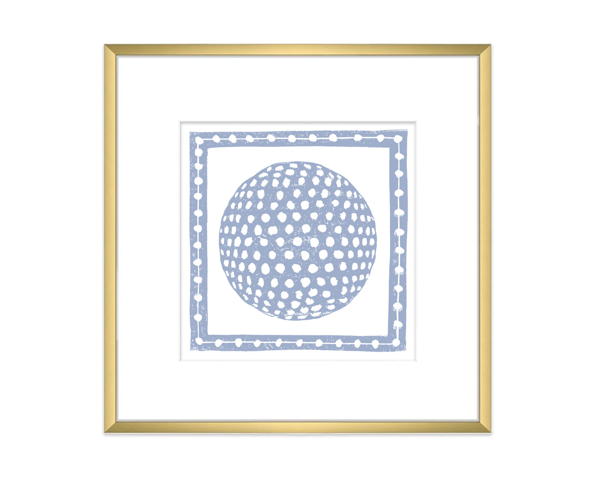 Framed artwork with a blue golf ball inside a white border on a white background