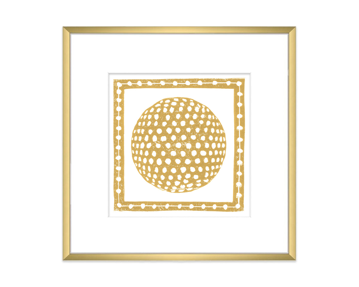 Framed artwork with a gold geometric design on a white background