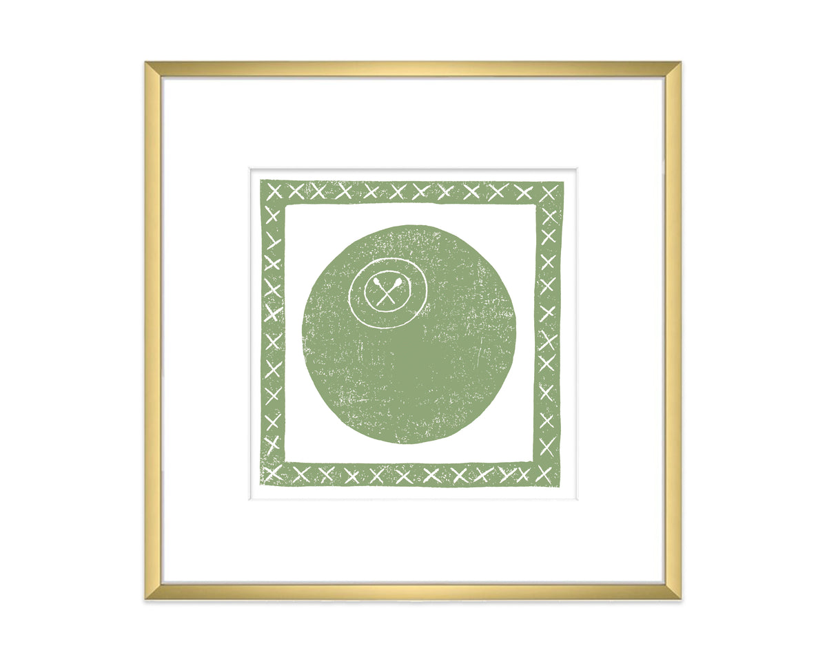 Framed artwork with a green circle and cross symbol on a white background