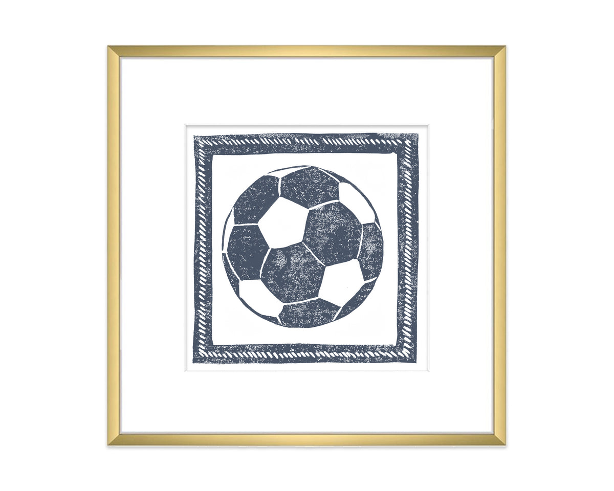 Framed artwork of a soccer ball on a white background