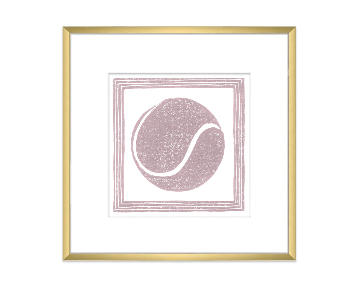 Framed artwork with a pink tennis ball design on a white background