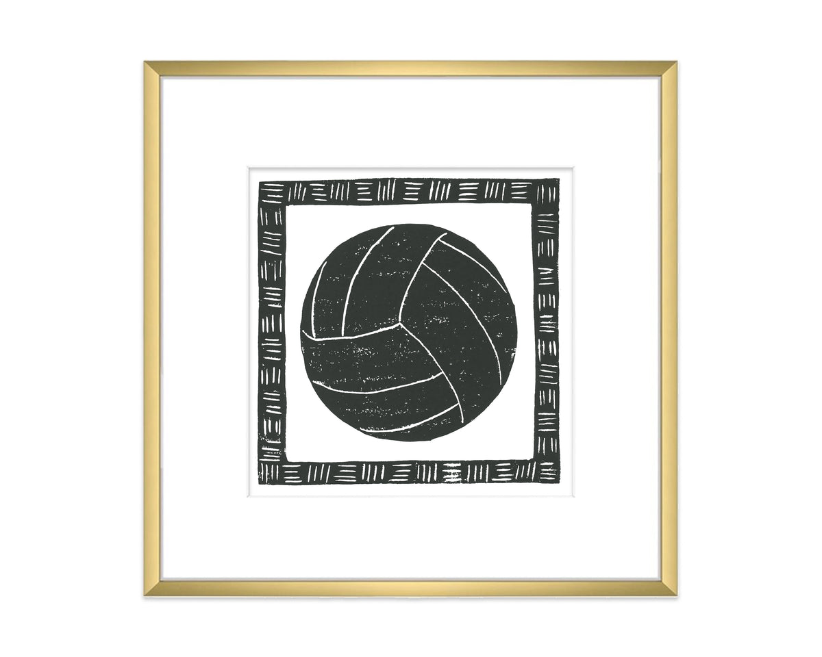 Framed artwork of a black ball with a gold frame on a white background