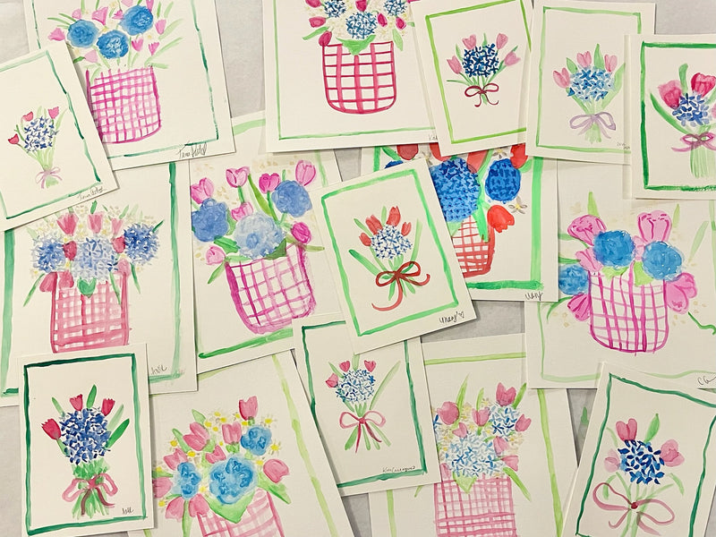 a collection of pink and blue floral paintings