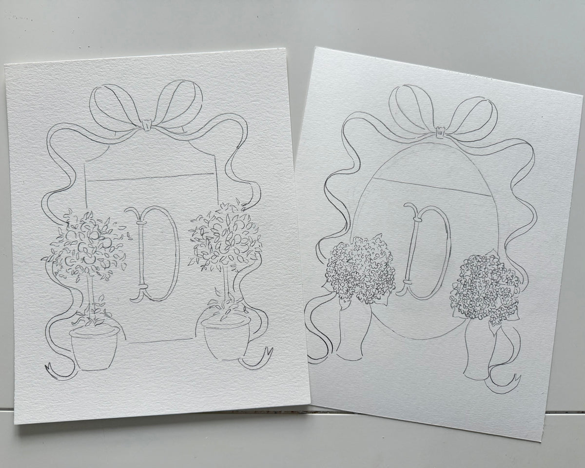 Two white greeting cards with black line art of plants and decorative elements on a gray background.