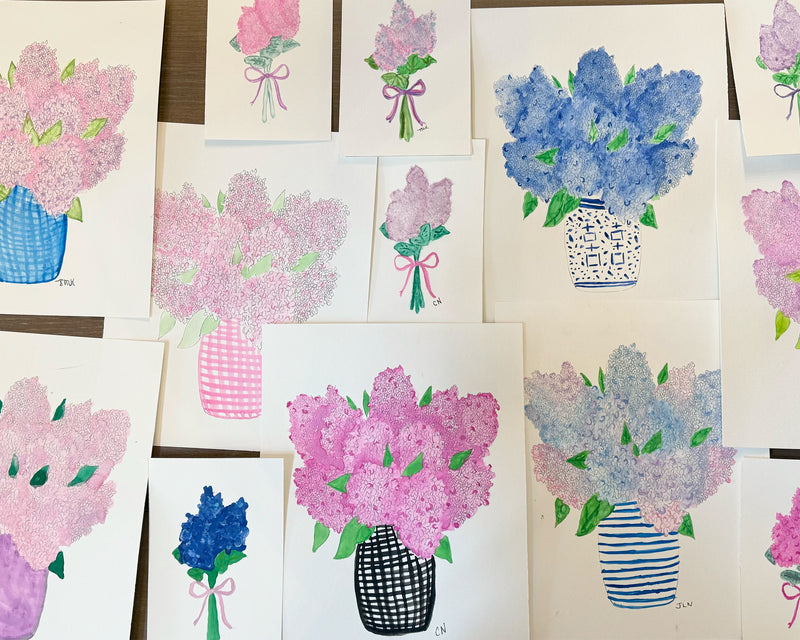 Collection of paintings with floral designs on a white background