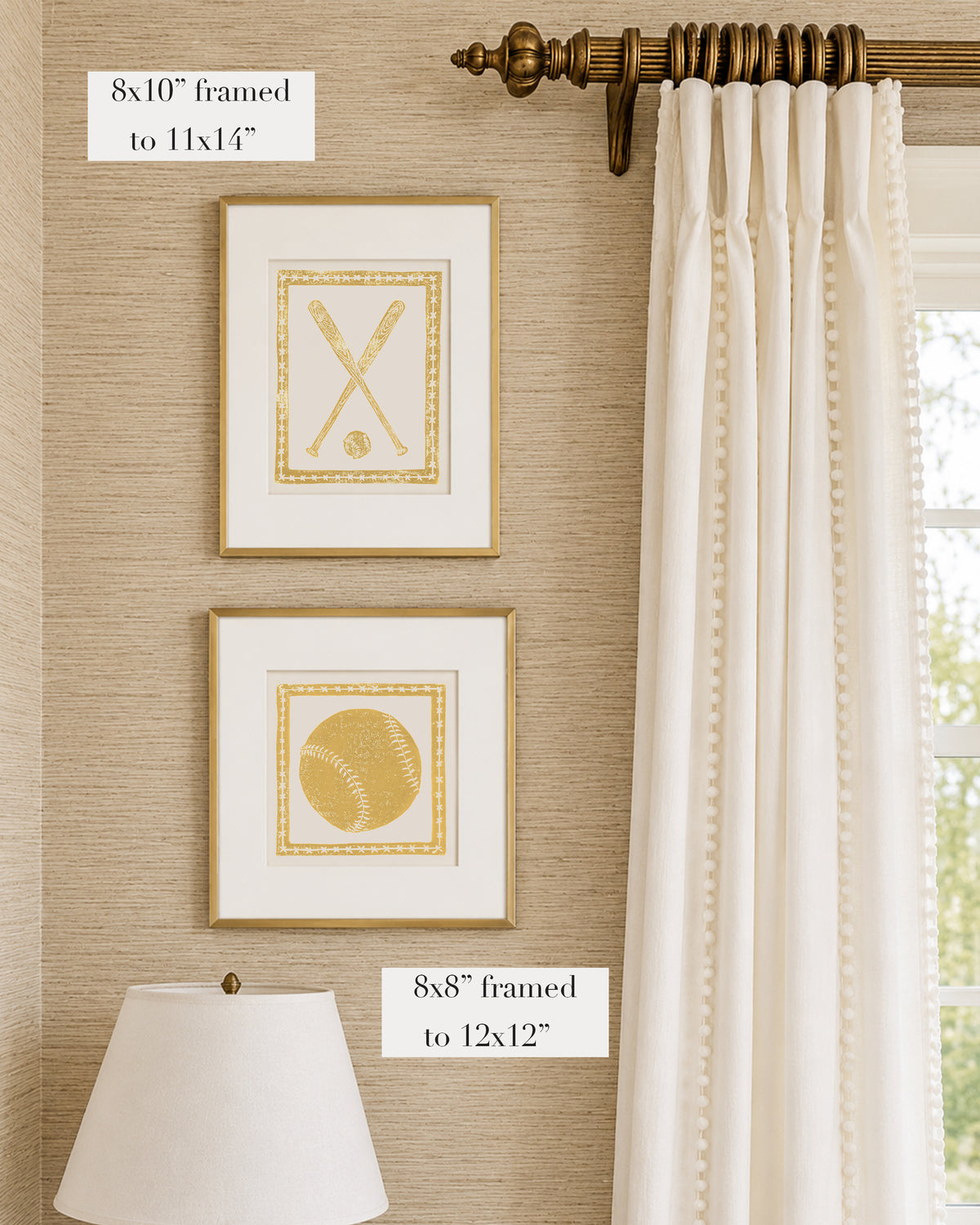 Framed mustard yellow and white softball themed artwork on a tan grasscloth wallpapered wall with a white window treatment and lampshade