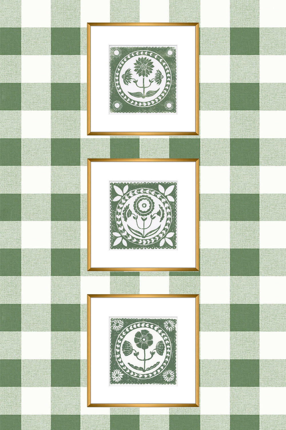 Three framed prints with green and white designs on a green and white checkered background