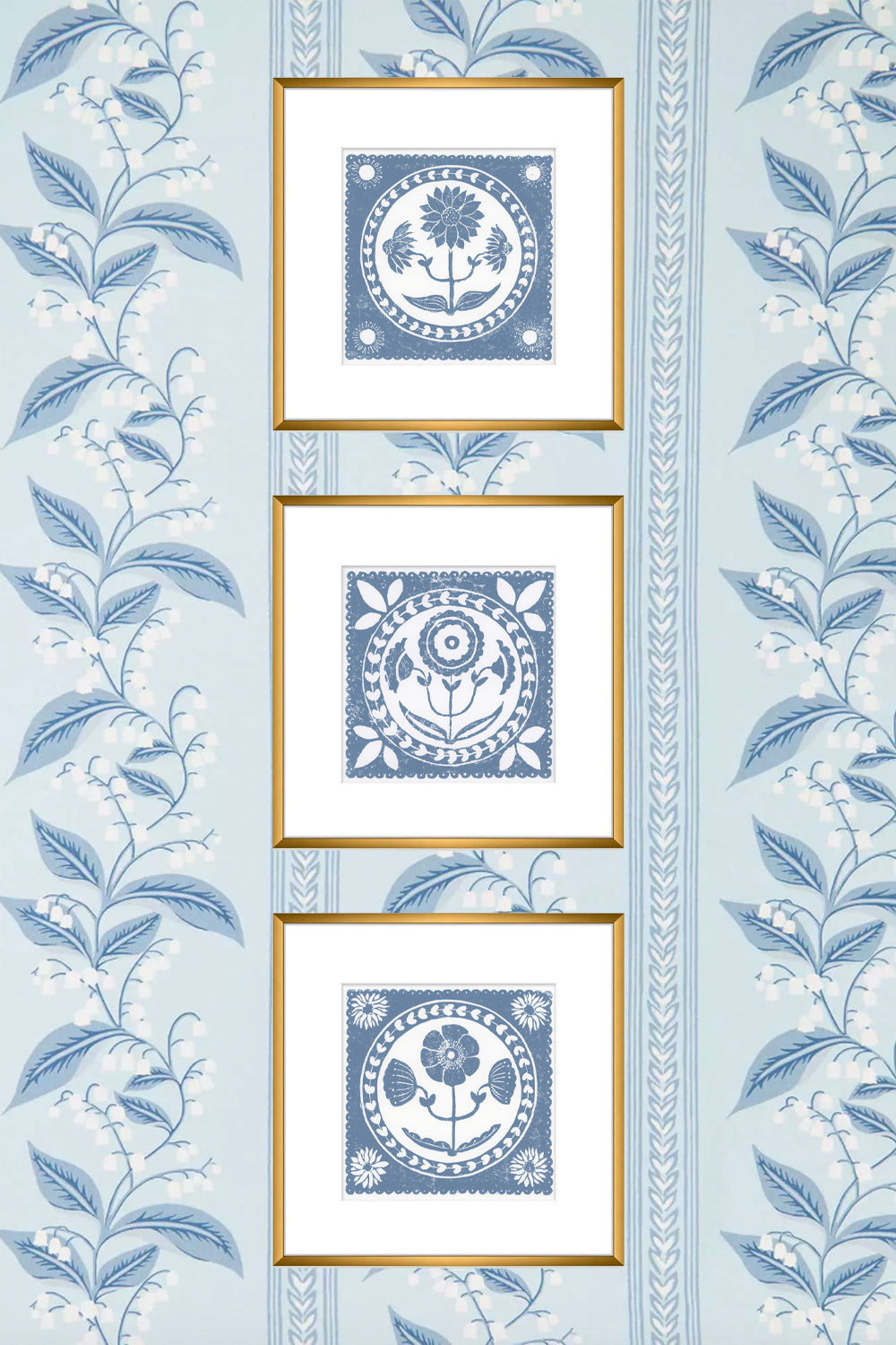 Three framed decorative elements on a light blue background with floral patterns