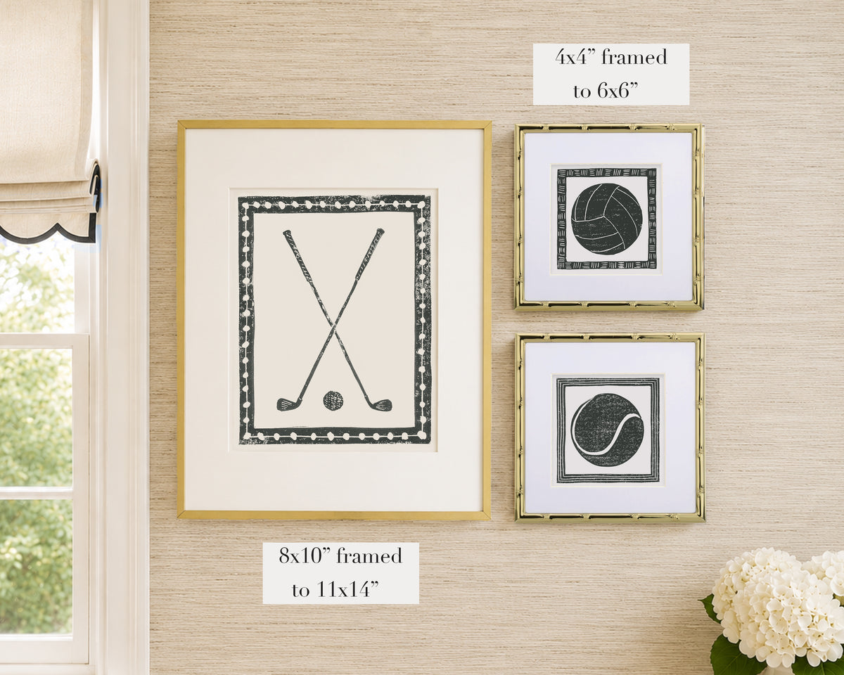 three frames hung on a tan grasscloth wall