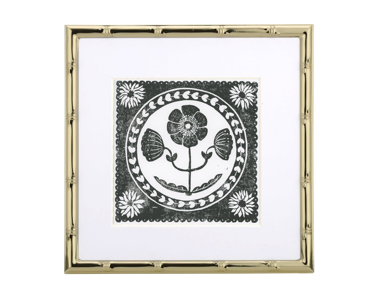 Decorative framed artwork with floral design on a white background