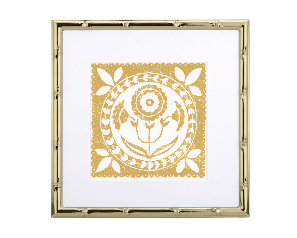 yellow and white floral design in agold frame