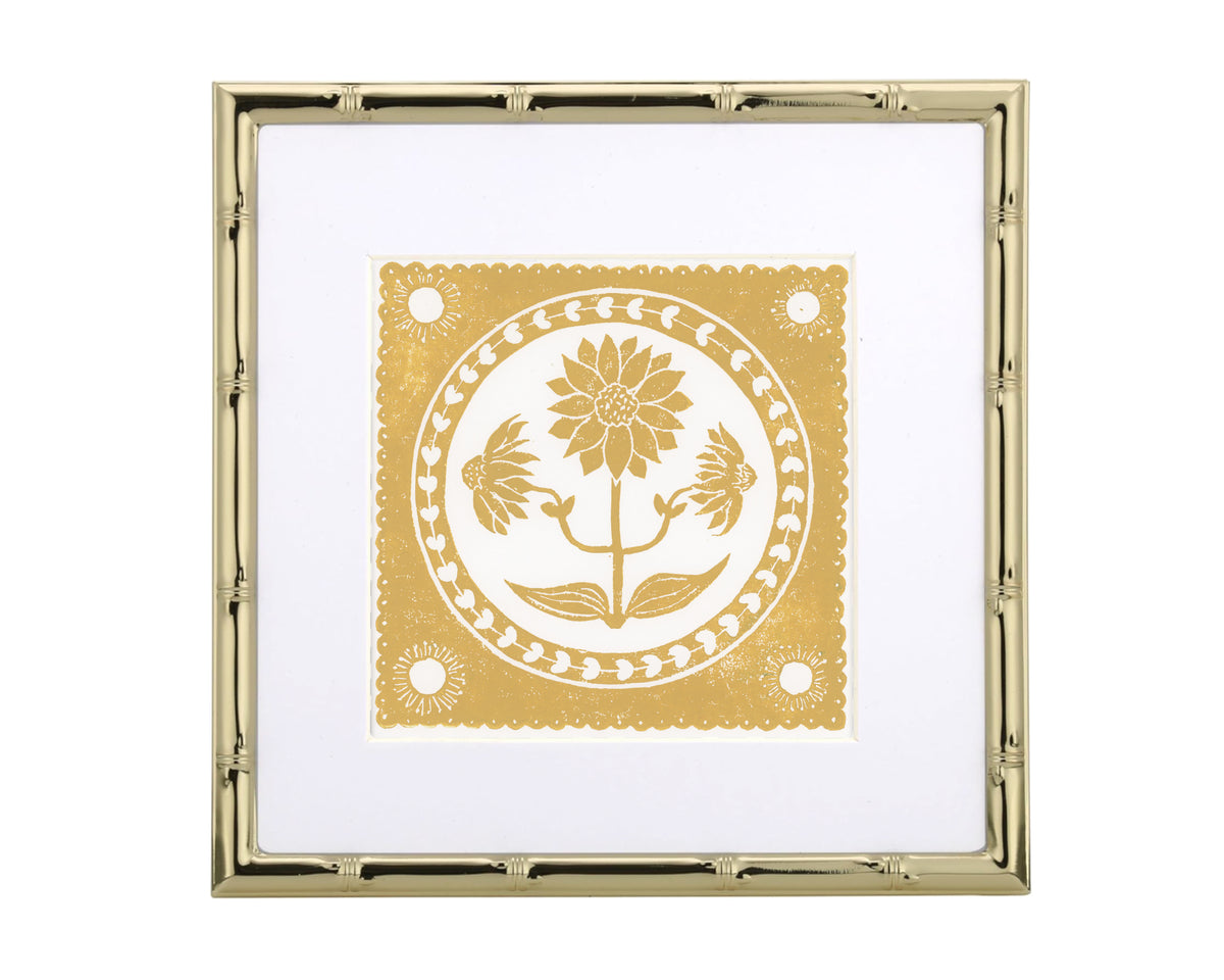 Decorative gold frame with floral design on a white background