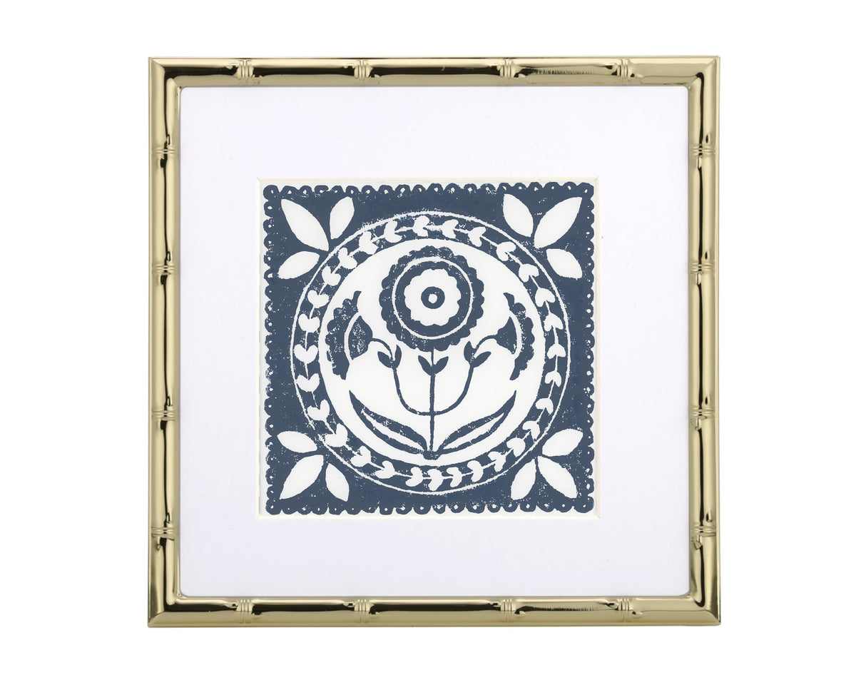 Decorative framed artwork with a blue floral design on a white background