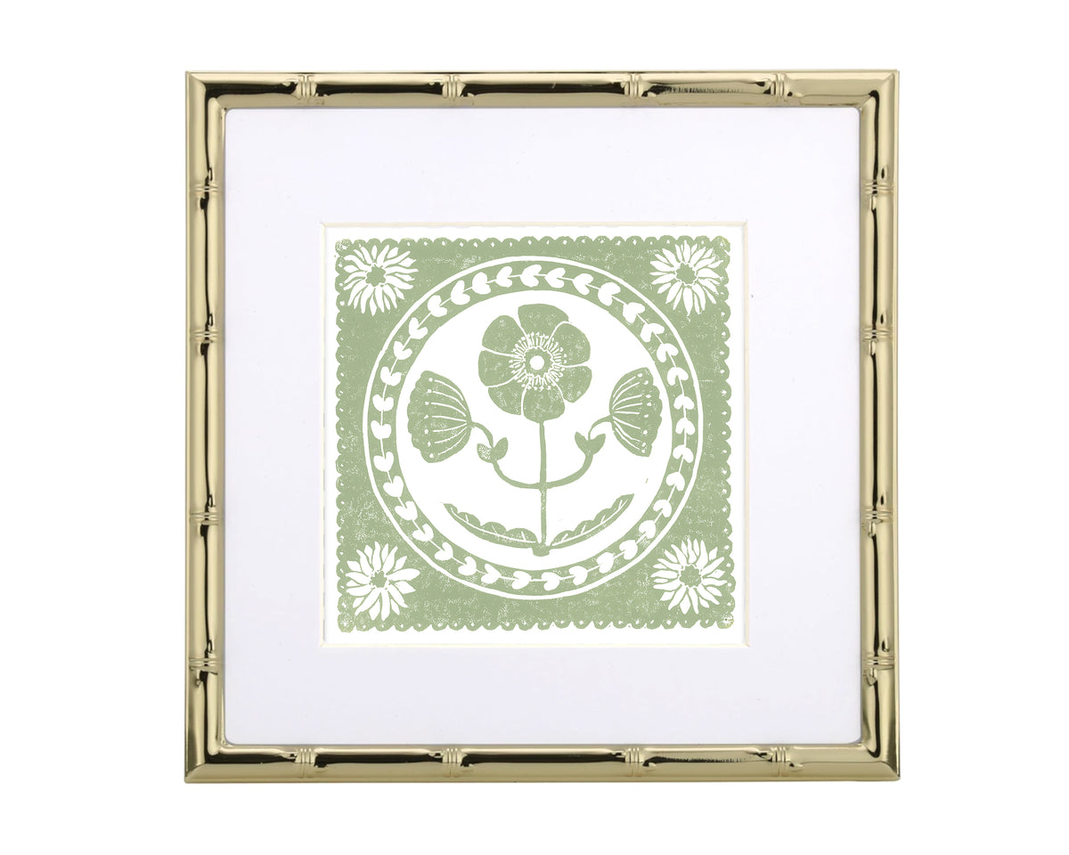 Framed artwork with a floral design on a white background