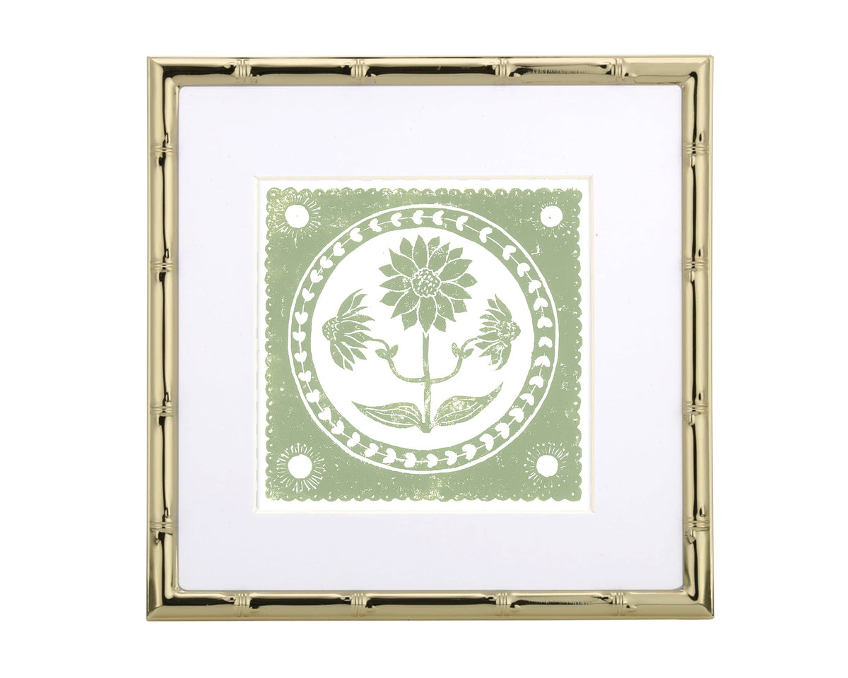 Decorative framed artwork with floral design on a white background